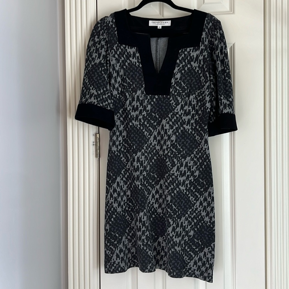 Trina Turk sheath dress in size 2 .  Slightly worn.  Good condition.
